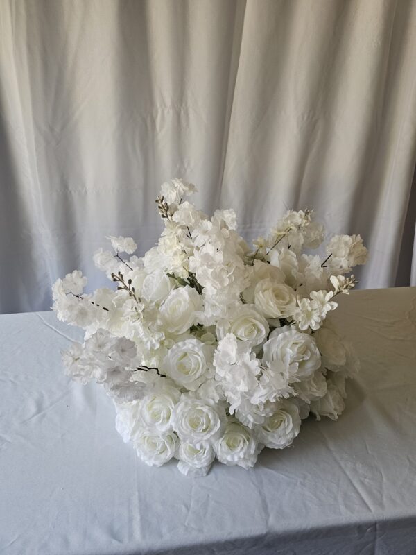 60 cms white floral arrangements (Colors can be customized for additional $10)